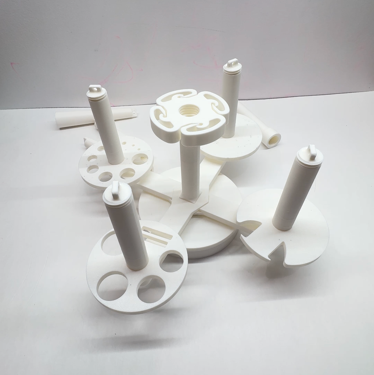 Multi Yarn Spinner 2.0 holding four yarn cakes side by side for crochet and knitting projects