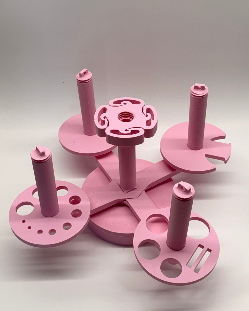 Multi Yarn Spinner 2.0 with removable yarn bobbins and smooth center spin for colorwork